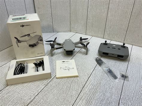 mini mavic 2|DJI Mini 2 – Ultralight and Foldable Drone Quadcopter, 3